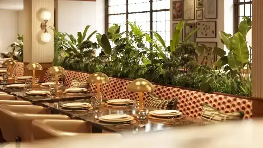 Elegant dining area with lush greenery.